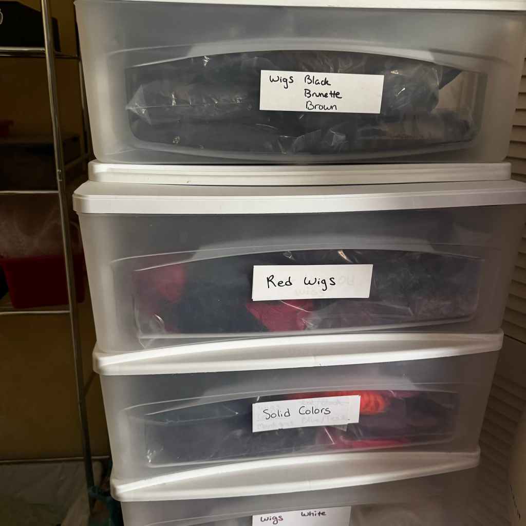 storing cosplay wigs, all organized by color