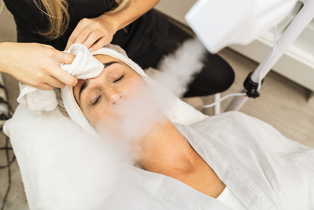 getting facial with facial steamer